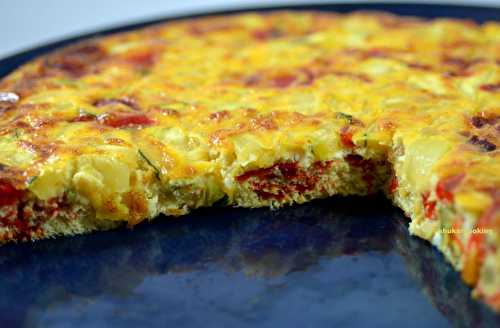 Omelette au four aux poivrons grillés et courgettes sautées