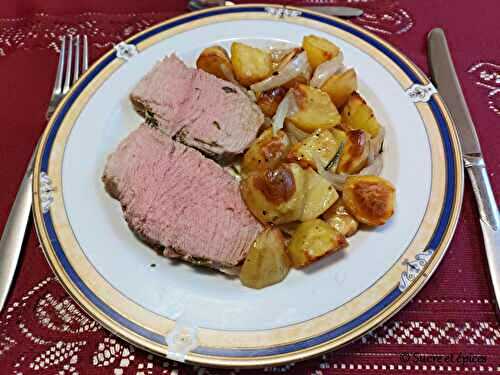 Rôti de veau et pommes de terre au four, ail et herbes