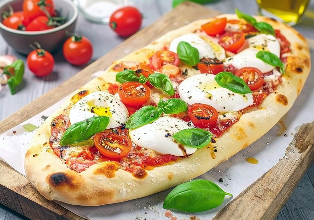 Pinsa romana maison tomates, burrata et basilic : l’alternative italienne qui détrône la pizza