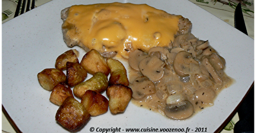 Côtes de porc au fromage fondant et champignons