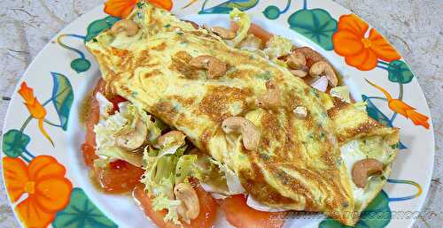 Omelette à la mozzarella sur un lit de tomates