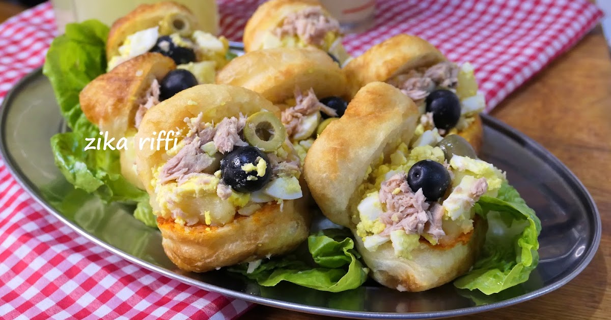 PETITS PAINS FRITS À LA SEMOULE  DE BLÉ DUR FARCIS DE SALADE DE POMMES DE TERRE À L'AIL ET AU THON