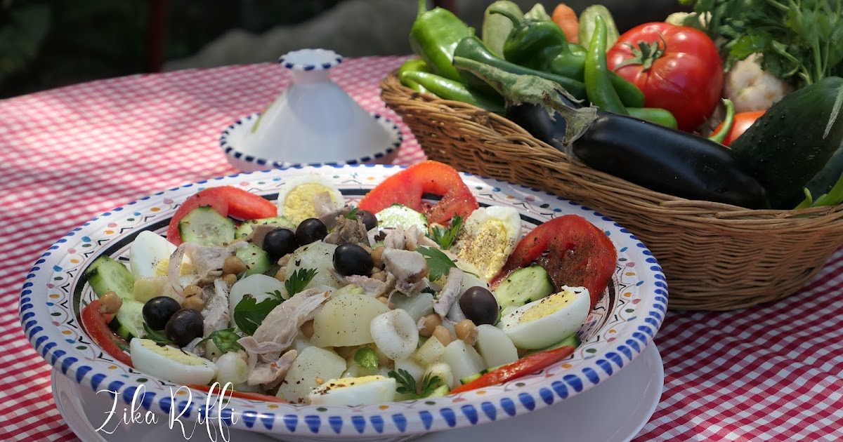 SALADE DE POMMES DE TERRE AU POULET- CONCOMBES- TOMATES- OIGNONS VERTS ET POIS CHICHES AUX ŒUFS DURS